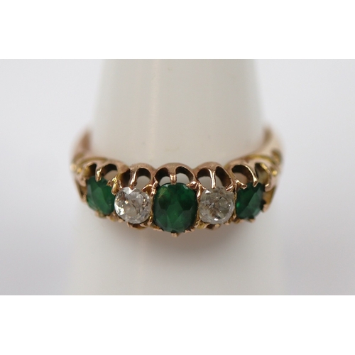 87 - 14ct gold diamond and emerald set ring - Size O - Approx 3.1g