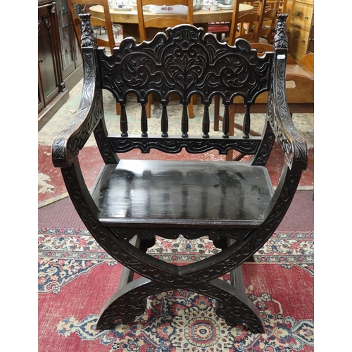 477 - Antique carved X chair