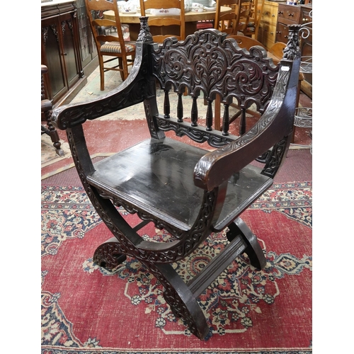 477 - Antique carved X chair