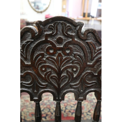 477 - Antique carved X chair