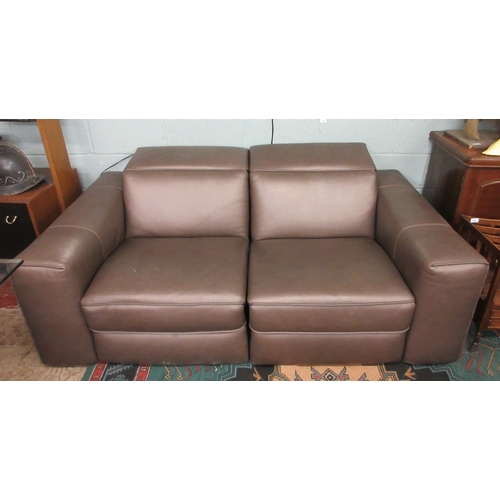 328 - Pair of good quality Natuzzi Italian two seater leather sofas. Motorised reclining mechanism. Origin...