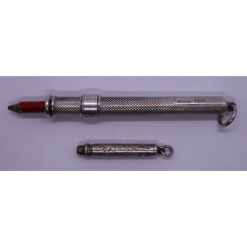 38 - 2 Antique silver propelling pencils. Gross weight 19.9g approx
