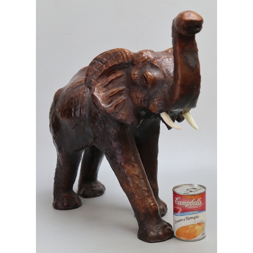 144 - Liberty's style leather 'fireside animals' elephant.  Mid 20th Century, good leather-bound condition... 