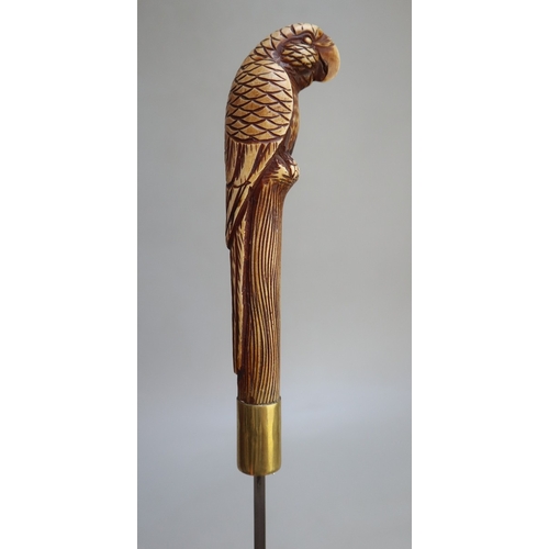 317 - Bamboo cane swordstick, with brass collar and ferrule and 'parrot' design handle