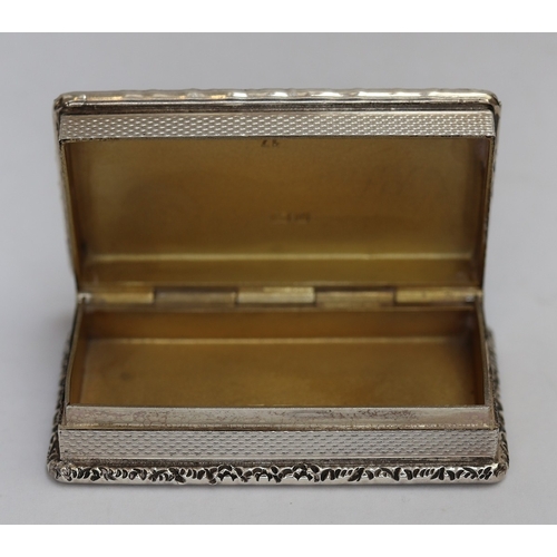 42 - A fine Garrard & Co silver presentation small casket. The heavy box has a cast border with vacan... 