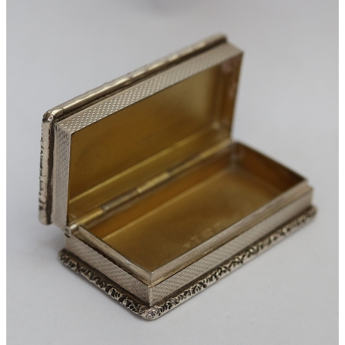 42 - A fine Garrard & Co silver presentation small casket. The heavy box has a cast border with vacan... 