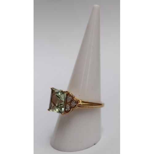 54 - 9ct gold diamond and stone set ring size Q. Approx weight 3.6gm