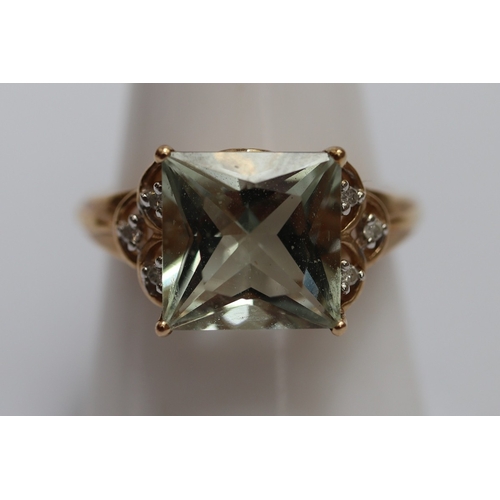 54 - 9ct gold diamond and stone set ring size Q. Approx weight 3.6gm
