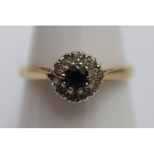 56 - 9ct gold Diamond and Sapphire set ring, size P.