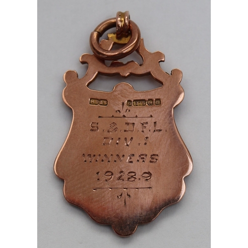 64 - 9ct gold medal pendant - Approx weight 5.2g