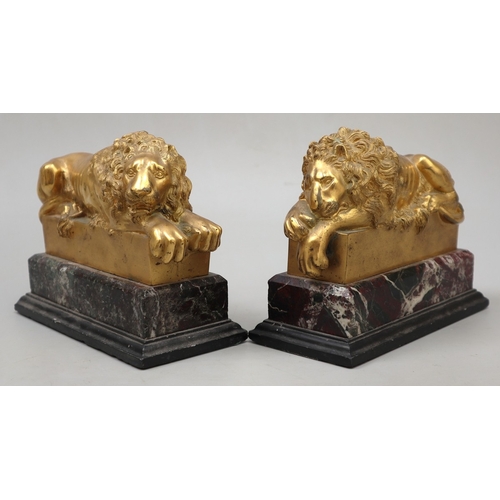 A pair of fine 19th century 'Grand Tour' gilt bronze recumbent lions after Antonio Canova. Each mounted on antico marble plinths - H: 15cm W: 19cm D: 9cm