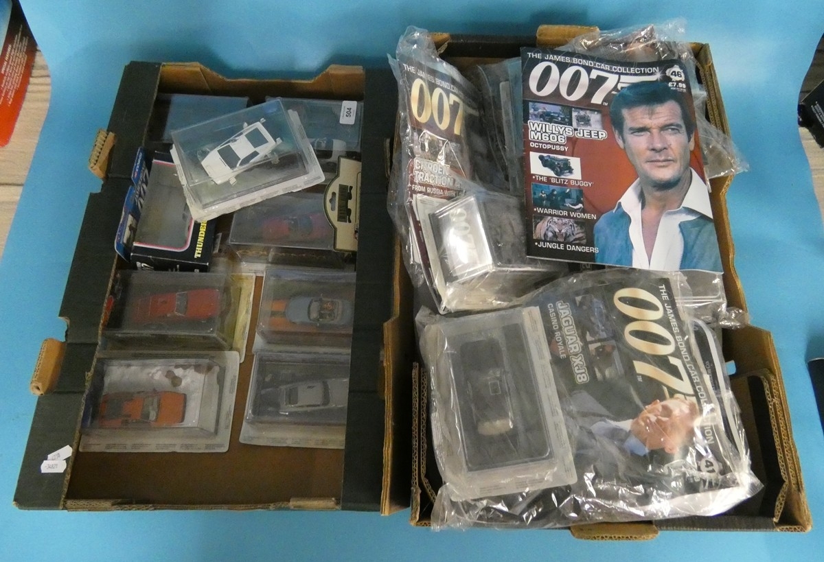 Large collection of boxed 007 vehicles