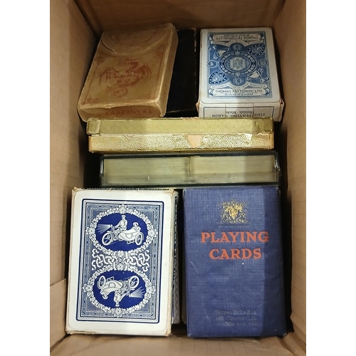314 - A box of vintage playing cards and card counters - 18 deck of cards to include 2 double packs and tw... 