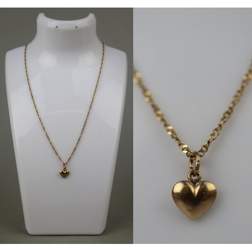 46 - 18ct gold chain with 9ct gold heart pendant- Approx 3g