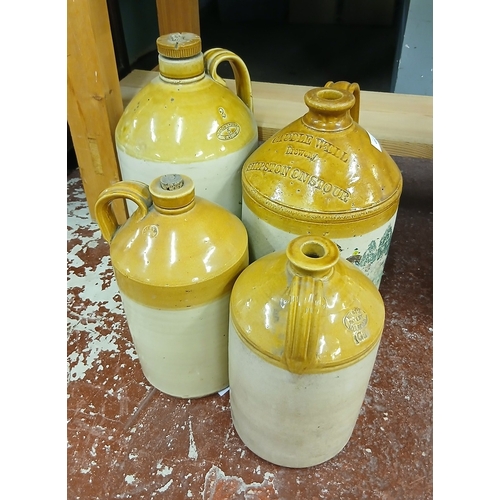 463 - Four stoneware flagons - Height of tallest approx 44cm
