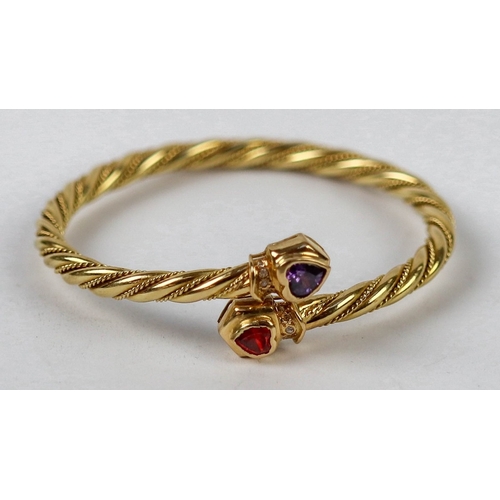 49 - 18ct gold stone set twist bangle - Approx 18.8g