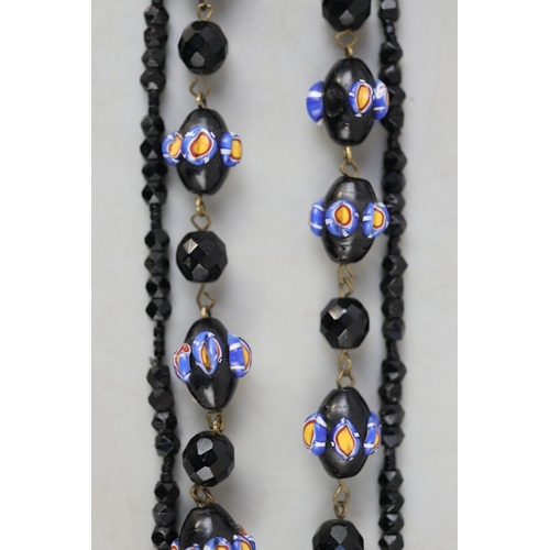117 - Three strings of vintage bead necklaces &ndash; millefiori, jet and gemstone