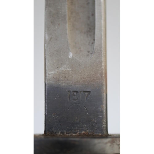175 - US 1917 issue Remington bayonet in leather and steel scabbard