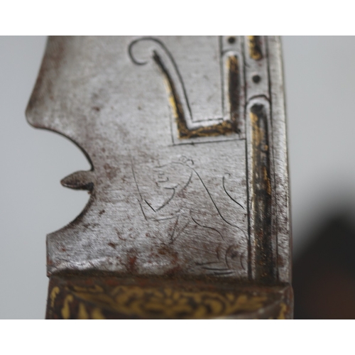 190 - Nepalese khukri with brass inlaid handle and religious etchings in black leather scabbard. Approx bl... 