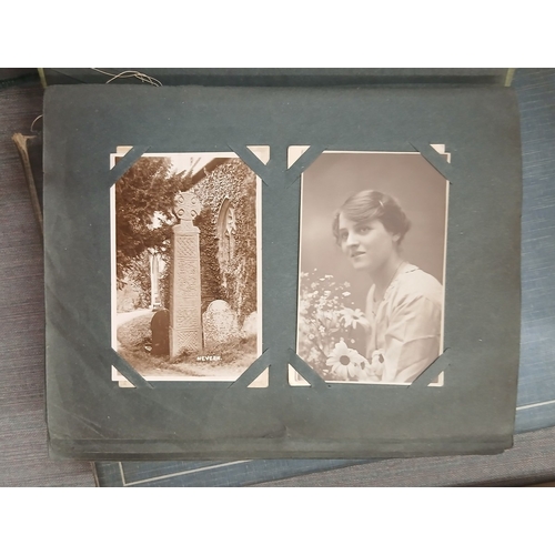 284 - 2 albums of postcards