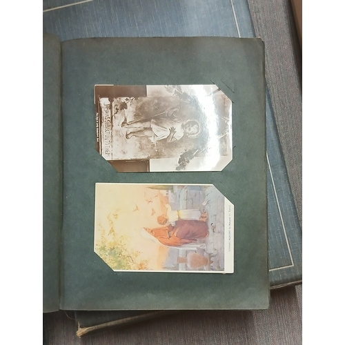 284 - 2 albums of postcards