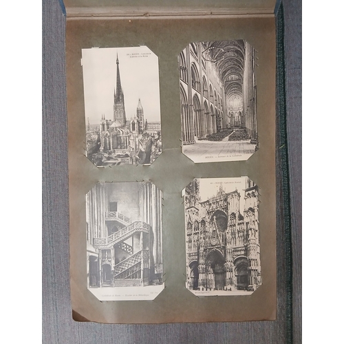 284 - 2 albums of postcards