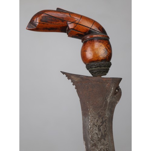 207 - A Javanese Keris (Kris), Indonesia, 19th Century A traditional Javanese keris (kris) with wavy blade... 