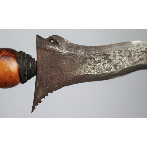 207 - A Javanese Keris (Kris), Indonesia, 19th Century A traditional Javanese keris (kris) with wavy blade... 