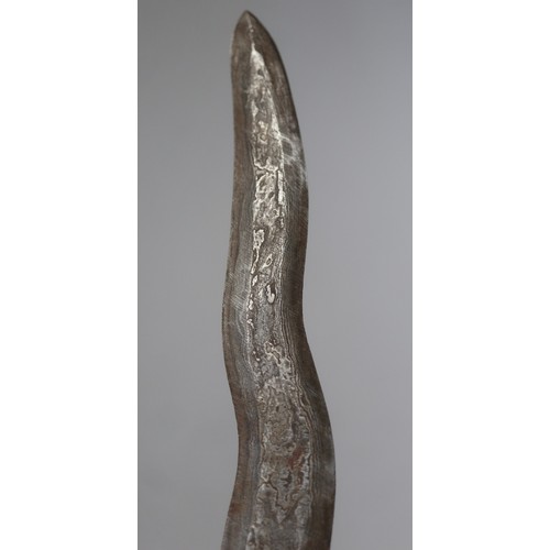 207 - A Javanese Keris (Kris), Indonesia, 19th Century A traditional Javanese keris (kris) with wavy blade... 