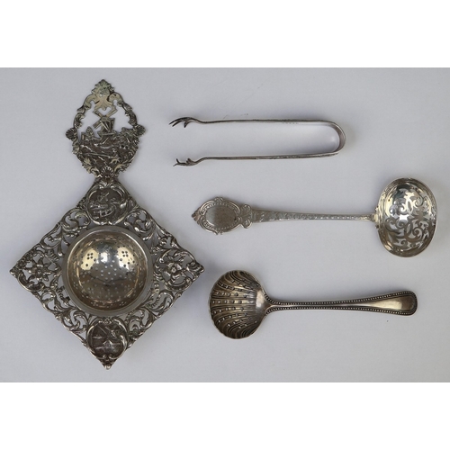 11 - Collection of hallmarked silver to include sugar nips and tea strainer
