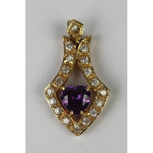 120 - 14ct gold heart shape amethyst and CZ set pendant- Approx 4.2g