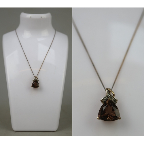 137 - Gold on silver brown topaz on chain