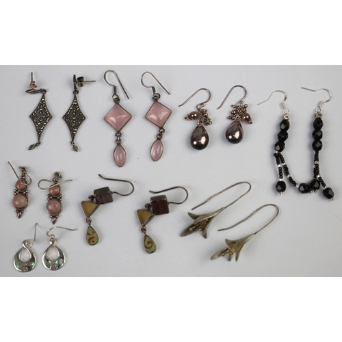 138 - 8 pairs of silver earrings