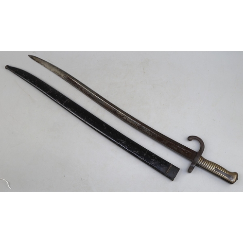 219 - French Chassepot sword bayonet manufactured in Armoury de St. Etienne in 1871, blackened steel scabb... 