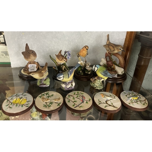 300 - Collection of ceramic birds and plaques to include Royal Albert