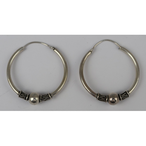 68 - Pair of silver hoop earrings