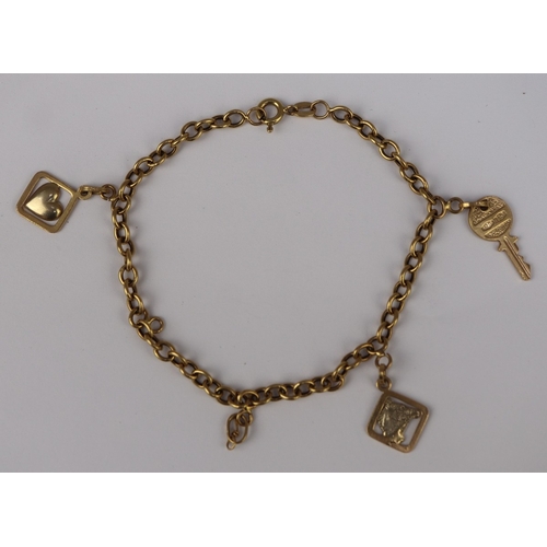 77 - 18ct gold charm bracelet - approx 7.8g