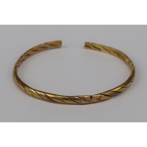 81 - 18ct gold bangle - 16.3g