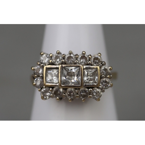 107 - 9ct gold CZ cluster ring - Approx weight 4.16g