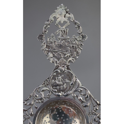 11 - Collection of hallmarked silver to include sugar nips and tea strainer