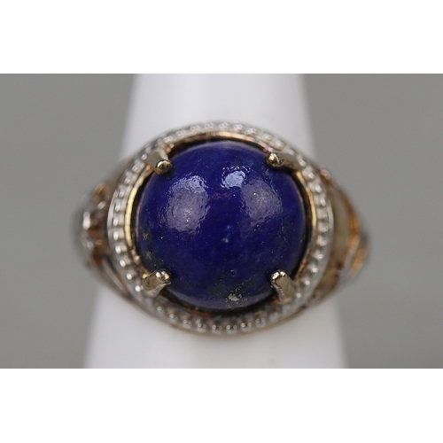 110 - Lapis lazuli sapphire, platinum and gold on silver ring with COA - Approx weight 6.75g