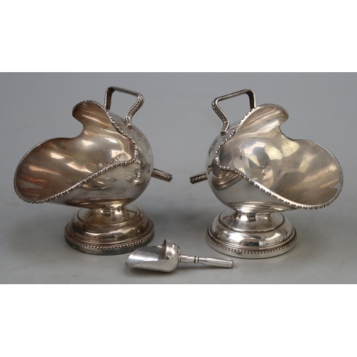 12 - Silver plated fire engine money box together with pair of silver plate firemans helmet scuttles, 1 w... 