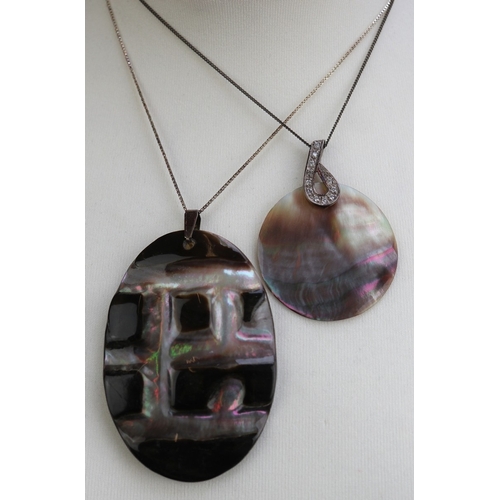 132 - 2 shell necklaces on silver chains