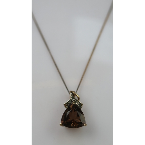 137 - Gold on silver brown topaz on chain