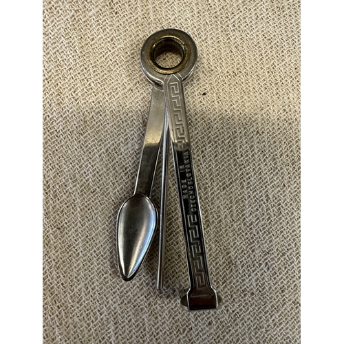 327 - Collection of interesting E.P.N.S and white metal to include nutcrackers, grape scissors, pipe clean... 