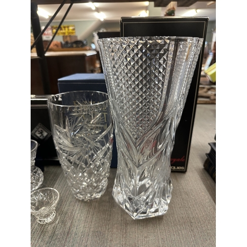 335 - Collection of crystal vases together with a crystal flame collectable