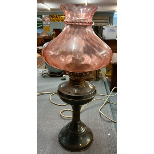 350 - Pair of electric lamps converted from oil lamps with cranberry glass shades - Approx H: 50cm