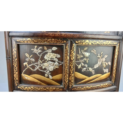 439 - Oriental mother of pearl inlaid corner cupboard