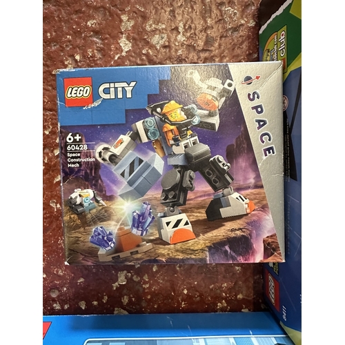 490 - Lego - 2 Lego city sets one with pieces missing together with a ben 10 lego set - 60141, 60428, 8411