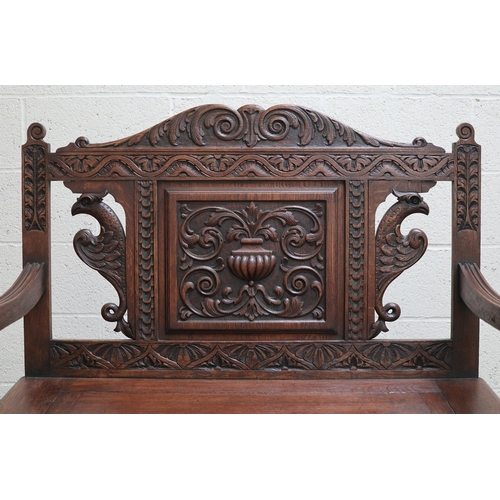 589 - Victorian carved oak settle with lift up lid - Approx W:106cm D:43cm H:104cm